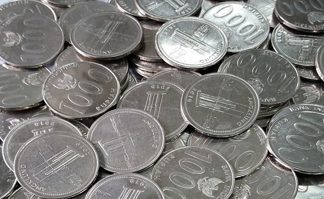ILustrasi uang koin pecahan seribu rupiah